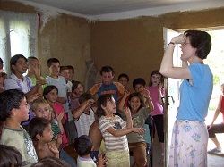 Ruth teaching a song during the children's program